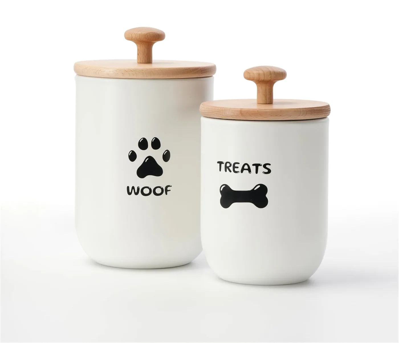 White ceramic Woof and Treats airtight dog treat jars with bamboo lids