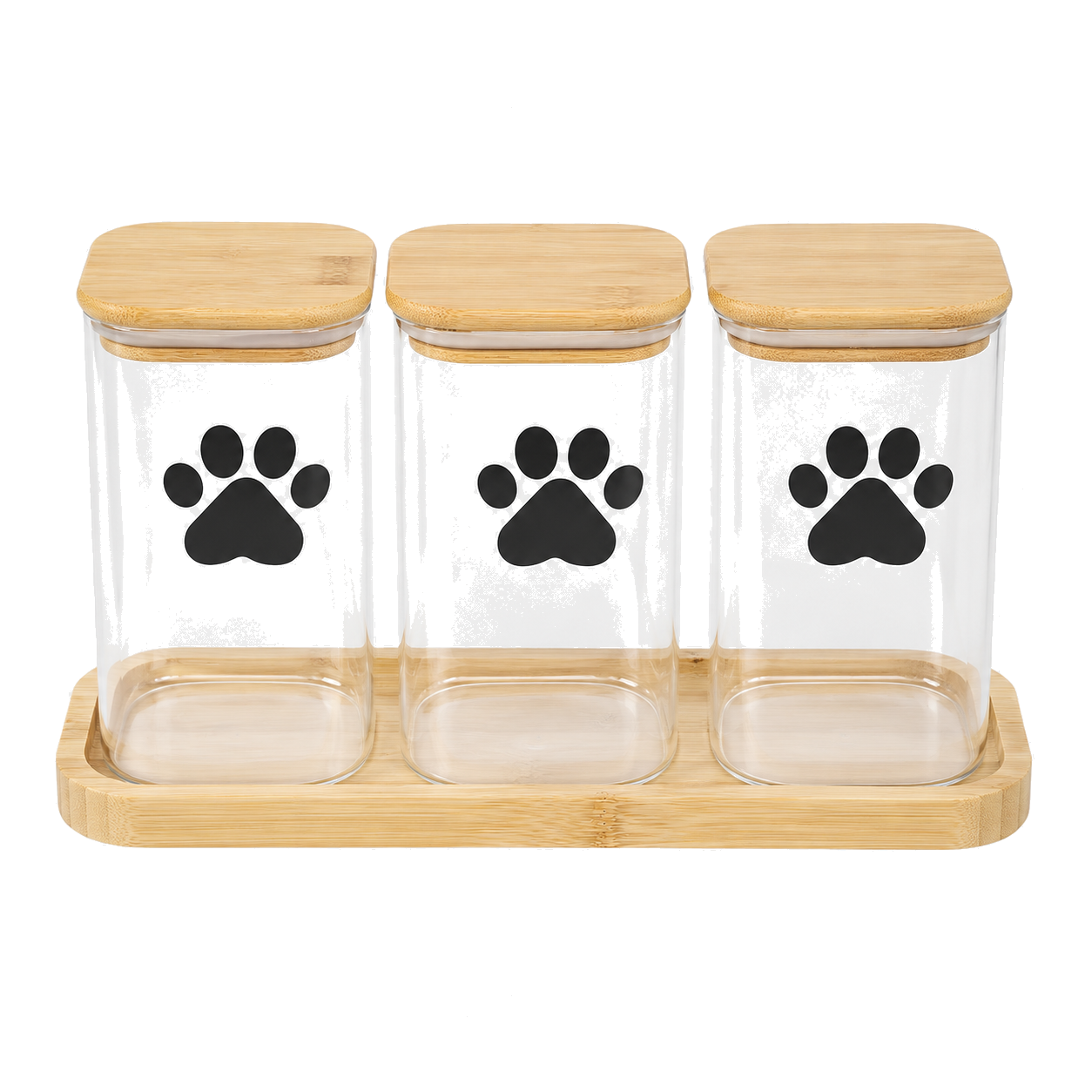 Set of three glass treat jars with bamboo lids on a bamboo tray