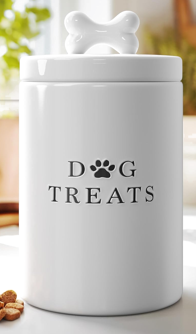 White ceramic dog treats jar with bone-shaped handle
