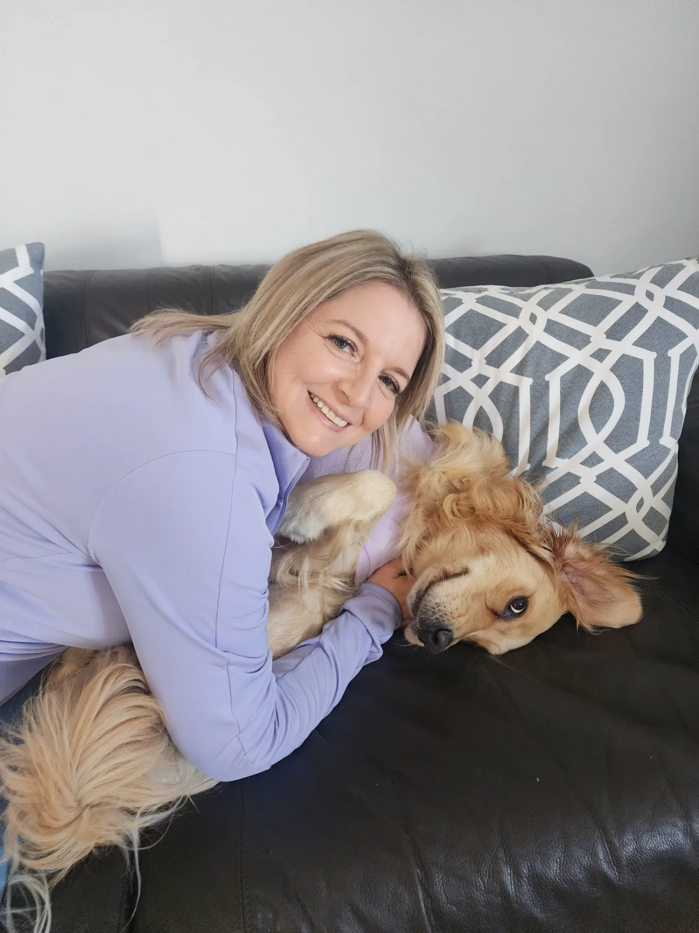 Anelda and Lana curled up together on the couch